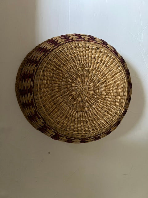 Vintage Hand-Woven Round Basket with Brownish Red Design
