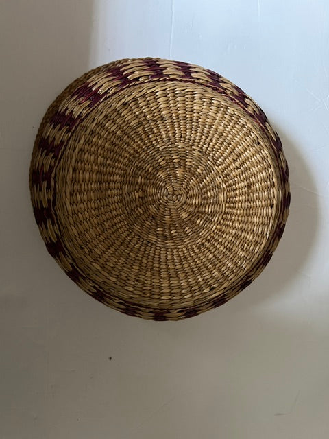 Vintage Hand-Woven Round Basket with Brownish Red Design