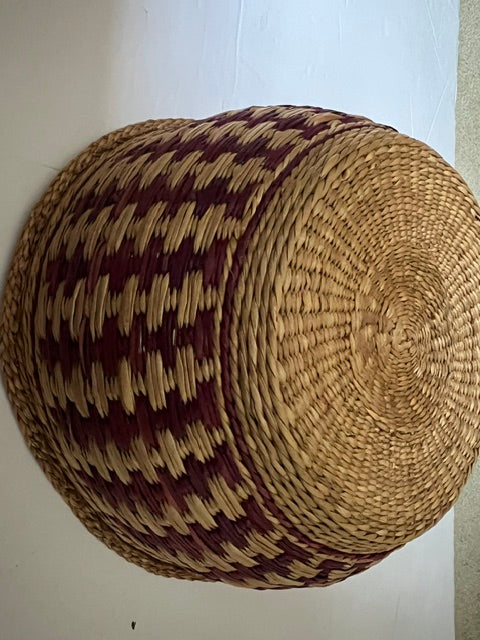 Vintage Hand-Woven Round Basket with Brownish Red Design